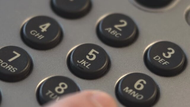Detailed Scene Of Business Professional Pressing Buttons On Illuminated Office Telephone For Communication . Media