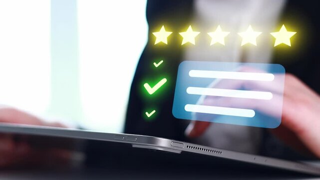 Rating system shows five stars with user input on tablet at office during work hours.