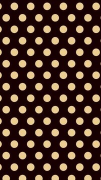 Animated Seamless Pattern Of Gold Outlined Circles Transforming Into Filled Dots Scrolling Up On A Black Background, Seamless Loop, 9:16 Vertical Video