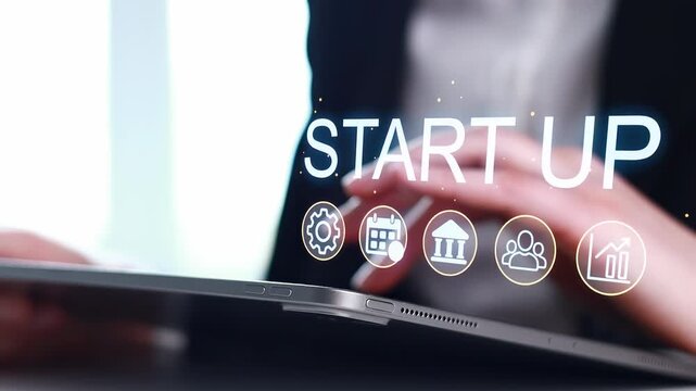 Creative professionals work on startup ideas and planning at a desk during a business meeting in a modern office.