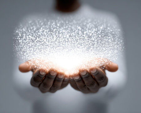 Artificial intelligence large language models LLM concept with glowing particles floating above open hands creating magical and inspiring visual