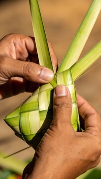 Macro Janur Coconut Leaf Weaving for Traditional Offering Canang Sari with Nimble Hands Focus