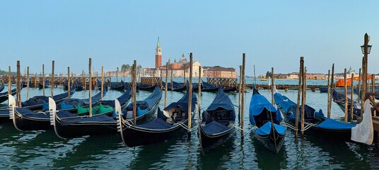 Panoramic view of many gondolas moored in front of San Giorgio Maggiore basilica, Venice, Italy © Vasyl  Diachuk