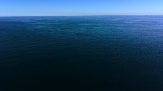 Aerial view of open blue ocean to infinity
