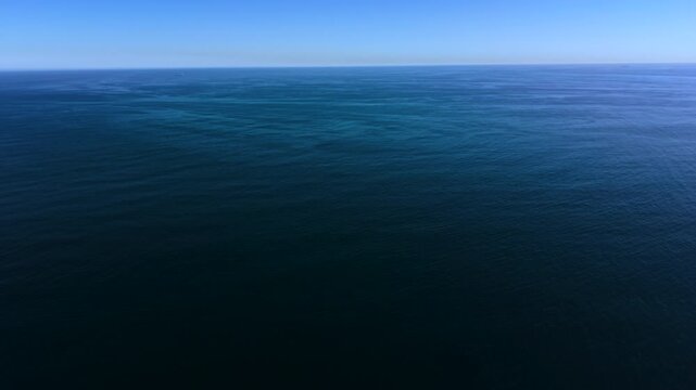 Aerial view of open blue ocean to infinity