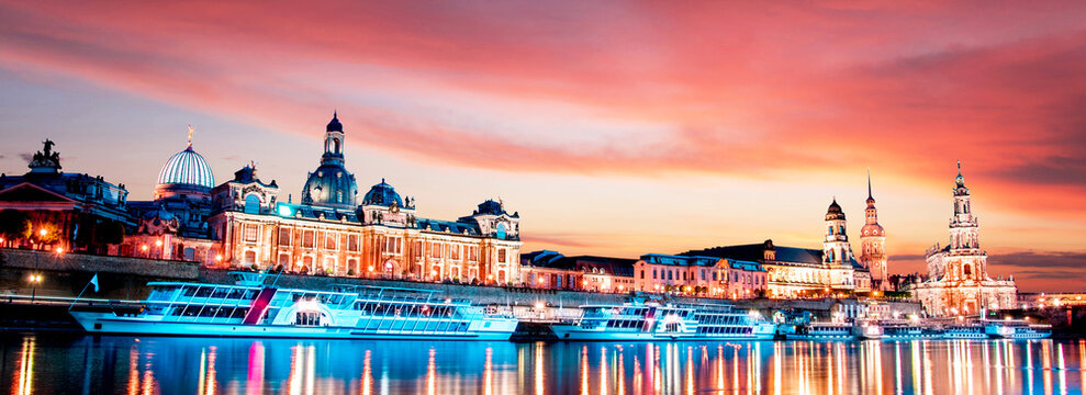 The picturesque view of old Dresden over the river Elbe in evening at sunset. Saxony, Germany. Banner