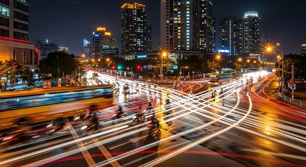 Obraz premium Nighttime city traffic light trails, urban commute, bustling metropolis, modern cityscape