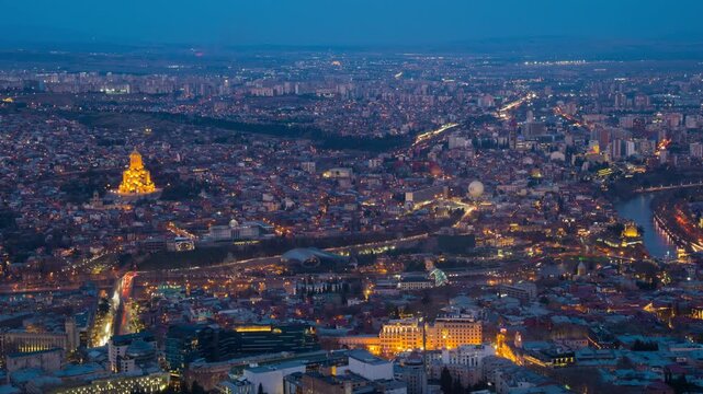 Tbilisi, Georgia. Aerial view of the city center of Tbilisi, Georgia. Time-lapse with car traffic from evening to night