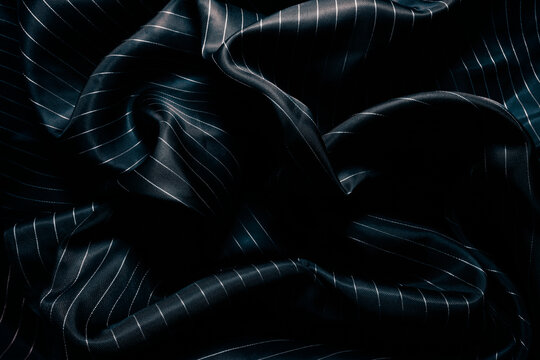 Elegant black silk background for fashion concept