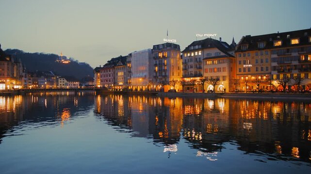 Shot of Lucerne illuminated old town and historic buildings at night