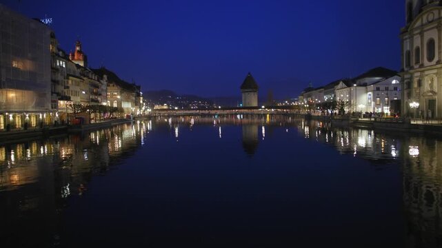 Shot of Lucerne illuminated old town and historic buildings at night