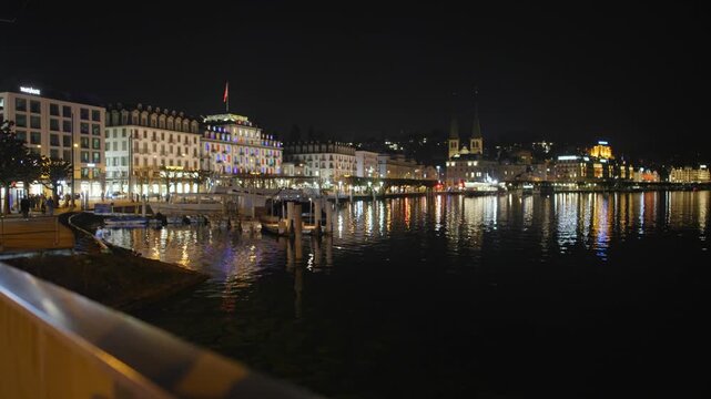 Shot of Lucerne illuminated old town and historic buildings at night