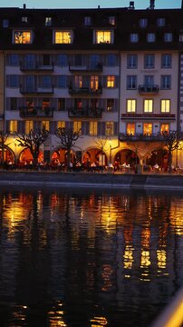 Shot of Lucerne illuminated old town and historic buildings at night