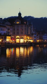 Shot of Lucerne illuminated old town and historic buildings at night