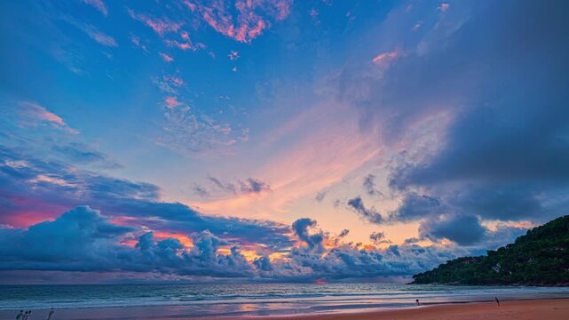 Time lapse Wave after wave hit on the shore in beautiful sunset. beautiful moving cloud in sweet sky at sunset at Karon beach Phuket Thailand.
4k stock footage cloudscape video in travel concept.