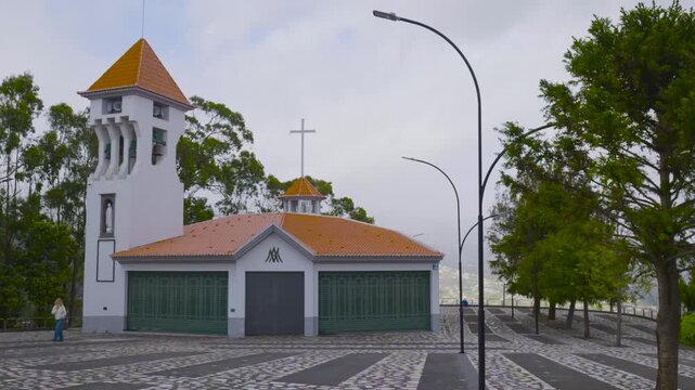 Woman walking in the pico dos barcelos belvedere in funchal