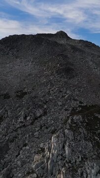 Majestic Aerial View of Rocky Mountain Peak and Vast Landscape in British Columbia, Canada
