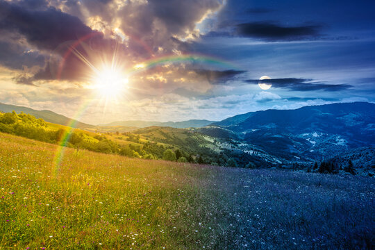 day meet night. mountain landscape with field. sun and moon in harmony over trees on the hills and rural valley beneath an epic sky in the background. view of carpathian mountains on summer solstice