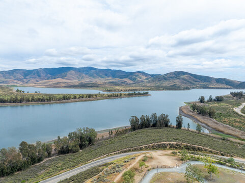 Aerial view of Otay Lakes County Park in Chula Vista, California, a scenic view of a mountain range, the lake. High quality photo