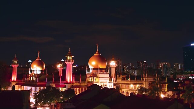Singapore city, Singapore - april 13, 2025: Sultan Mosque Singapore night timelapse glowing domes city skyline islamic architecture and travel destination. Muscat Street. Arab Quarter neighborhood