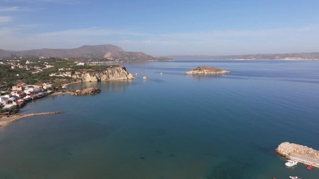 Aerial drone shot.View of famous beach in the summer, Crete, Greece. Famous beach with river and palm trees in Libyan sea. Tropical island, Panoramic view, Most beautiful beaches of Crete island