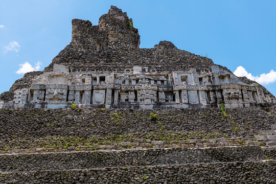 Mayan sculpted friezes and carved bas relief decorations, El Castillo Pyramid, Xunantunich, Belize.