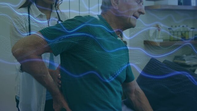 Male patient holding back, nurse examining with stethoscope, monitoring pain via blue wave overlay