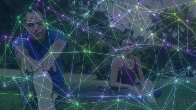 Man initiating deeper reach, pair doing leg stretch on grass, network overlay showing fitness gains