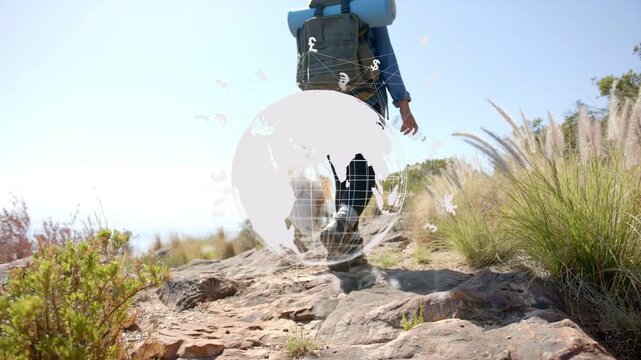 Woman hiker taking rocky step, climbing trail as rotating globe overlay obscuring showing finance