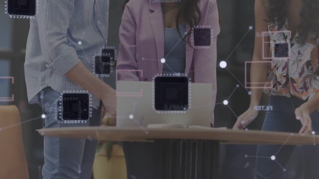 Man tapping phone, team opening laptop and checking tablet while node overlay showing tech data