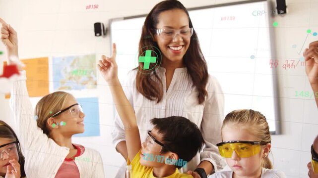 Child handling test tube and beaker starting science lesson, teacher guiding students raising hands