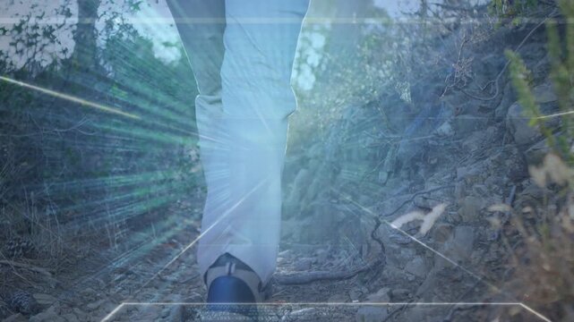 Male hiker starting step, hiking trail for recreation while radial streaks overlaying shoes by vine