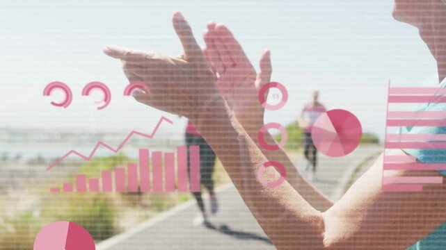 Supporter clapping as bib 1203 runner approaching path, pink HUD expanding analysing fitness data