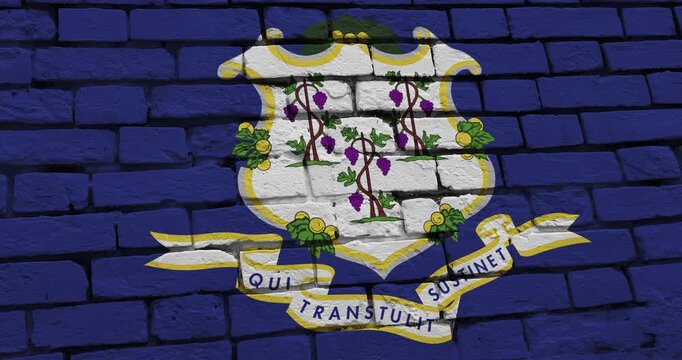 A panning video of a brick wall with the connecticut state flag of the United States of America