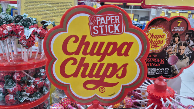 A close-up shot of a bright yellow and red Chupa Chups lollipop display. Picture taken on April 29, 2026 in Bucharest, Romania.