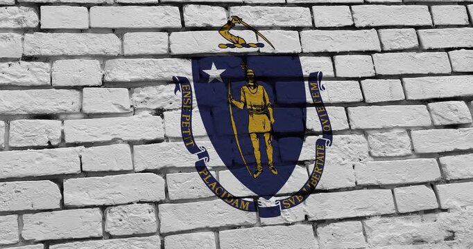 A panning video of a brick wall with the massachusetts state flag of the United States of America