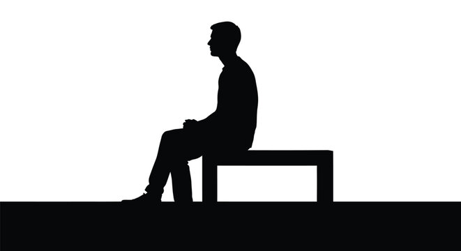 Silhouette of a pensive young man sitting quietly on a wooden bench against white background
