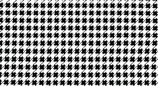 Classic black and white houndstooth fabric pattern featuring a repetitive geometric design for modern textile decoration