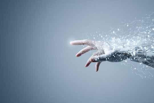 Robot hand with digital circuits and light particles on gray background as artificial intelligence concept