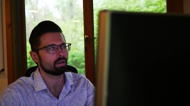  A Man is Laid off from his job via email - Vertical