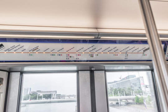 Paris, France - July 29 2016: Paris metro line map inside modern public transit carriage.
