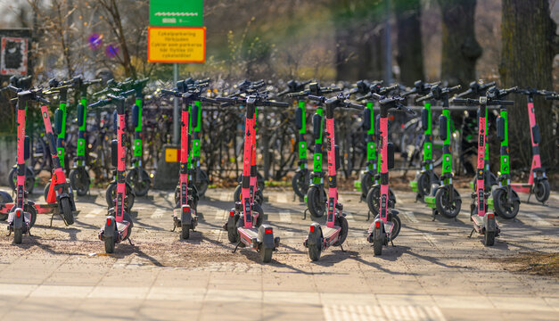 V?ster?s, Sweden - April 18 2026: Row of electric scooters parked outdoors in city for shared micro mobility transport.