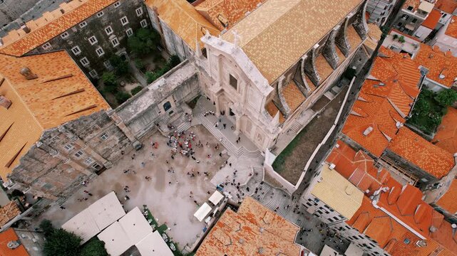 Cityscape from above. Elevated perspective showcasing bustling marketplace and architectural details
