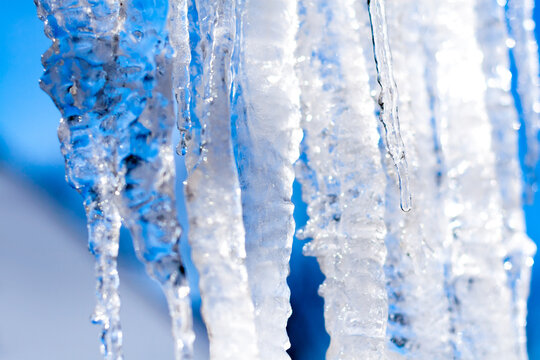 Large icicles against a blue sky