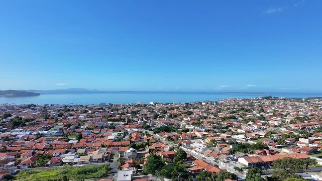 Iguaba Grande Aerial drone forward shot revealing cityscape from the Dona C&eacute;lia viewpoint. Aerial view of a beautiful city in the Lakes Region, and a panoramic video of Araruama Lagoon.