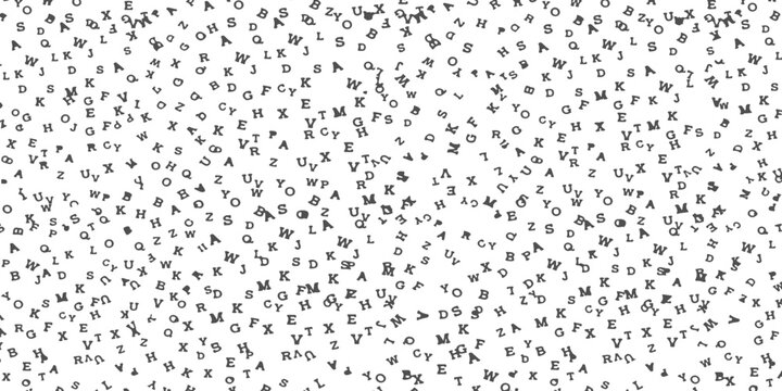 Black letters scattered randomly on a plain surface creating a textured alphabet pattern