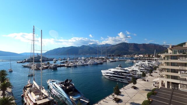 Tivat, Montenegro - June 29, 2025: Midday Luxury Yacht Panorama Porto Montenegro