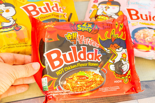 Korean instant ramen, Popular spicy noodle brand Buldak in spicy, cheese and carbonara flavors, global trend popular food product, snack sensation selection, fiery and creamy varieties