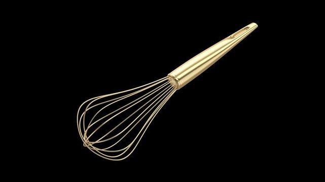 Spinning golden balloon whisk on black background