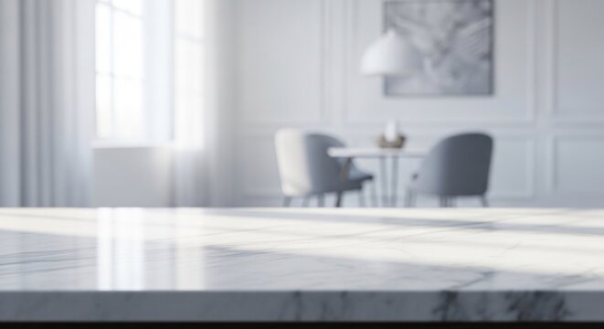 Softly lit room with marble table in foreground, two chairs, dining table